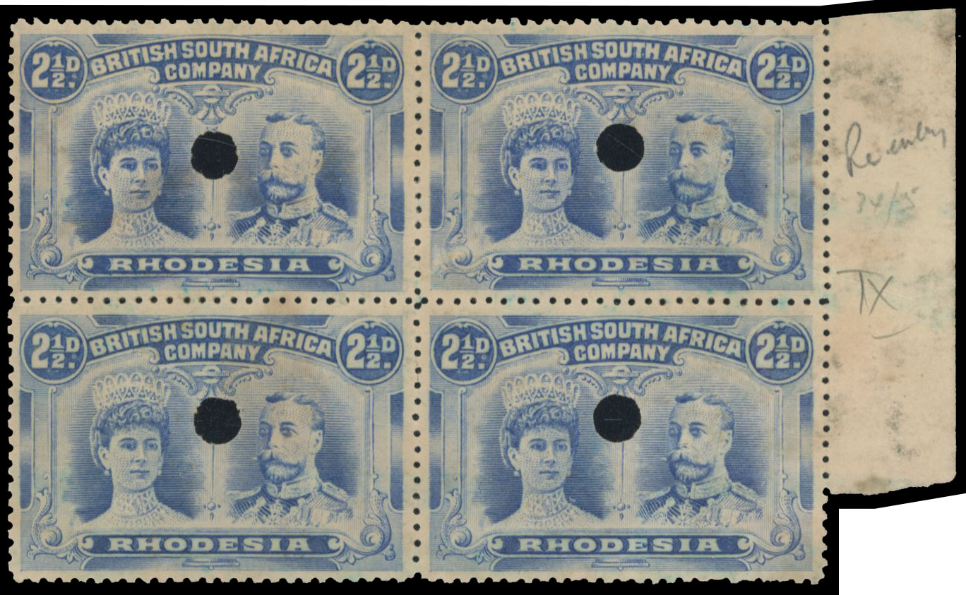 † 2½d punched holes block