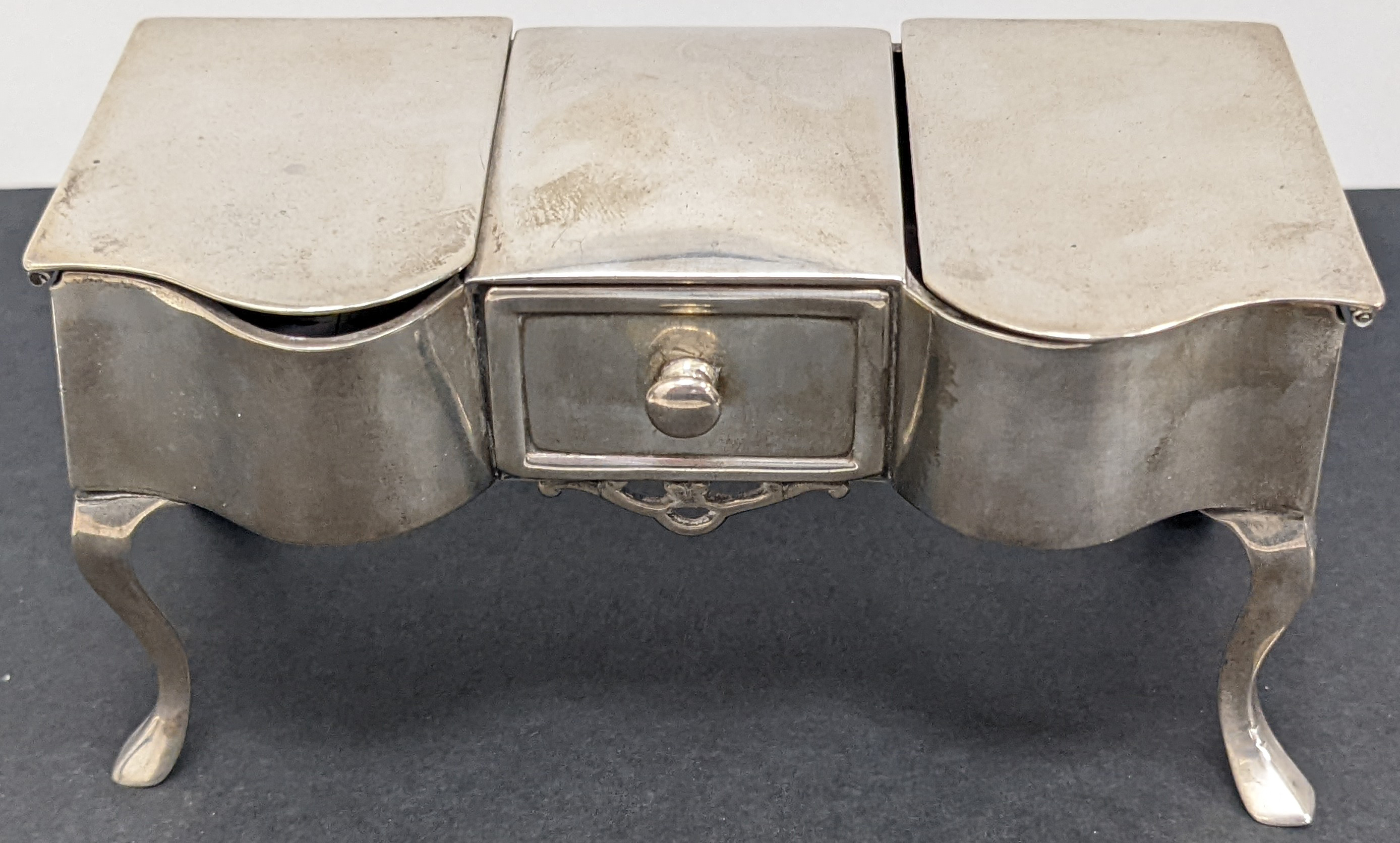 Ephemera: A silver, three-compartment dressing...