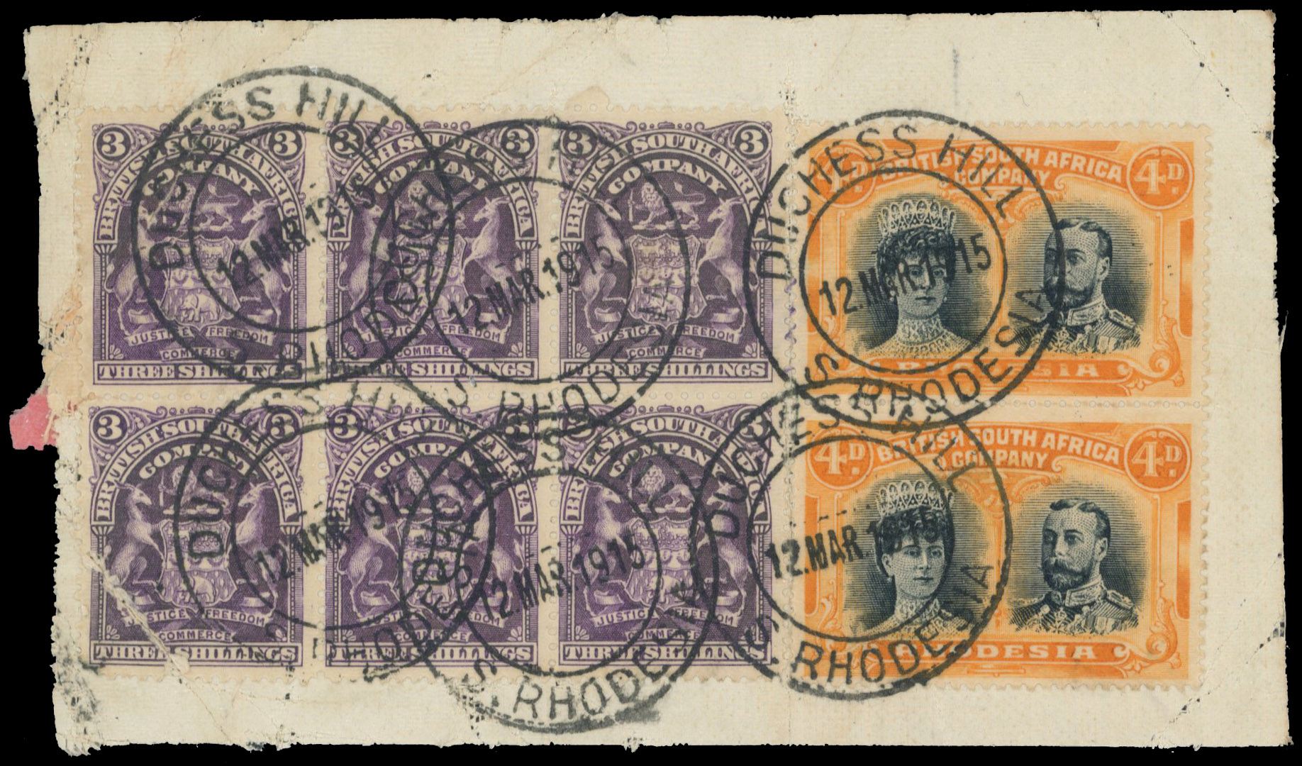 4d blue-black and yellow-orange perf 15 RSC E, vertical pair with Arms 3/- block of six on parcel tag