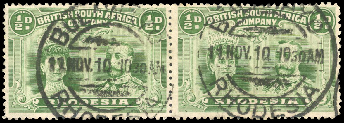 Rhodesia 1910-13 ½d yellow-green perf 13½ pair cancelled on first day of issue
