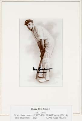 CRICKET Don Bradman signed photographic presentation,
 b & w 16 by 10cm. photograph portraying Bradman as a young batsman, signed in black marker. Att