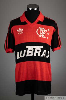 Zico red and black No.10 Flamengo v. Argentinos Juniors match worn short-sleeved shirt, 1989, 
 Adidas, with v-neck collar and sponge badge

 The abov