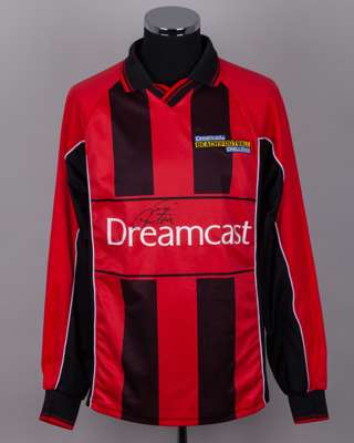 Eric Cantona autographed red and black No.5 Dreamcast Beach Football Challenge shirt