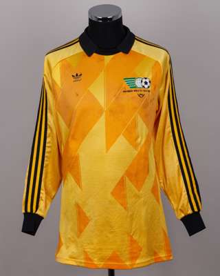 Pat Jennings yellow and black No.1 FIFA/UNICEF All Star match worn goalkeepers shirt, 1986