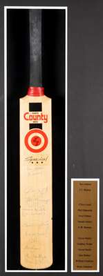 A signed cricket bat formerly owned by the broadcasting legend Brian 'Johnners' Johnston and on display at his flat overlooking Lord's Cricket Ground,