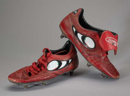 A pair of signed John Barnes match worn Oro boots,
 The boots show much evidence of match wear and both are signed by John Barnes. No size is evident,