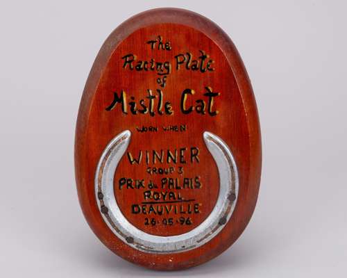 Racing plate worn by Mistle Cat when winning the 1996 Prix du Palais Royal
