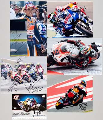 Motorcycle racing set of signed photographs,
 including Jorge Lorenzo, Dani Pedrosa, Danilo Petrusei (2), Karl Abraham, Pol Espargaro, Andrea Dovizios
