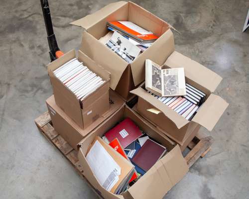 A pallet of football scrapbooks, pictures, notebooks, autographs, newspapers and ephemera