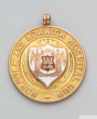 Tom Wilson 9ct gold and enamel 1922-23 Norfolk and Norwich Hospital Cup medal
 the obverse inscribed NORFOLK AND NORWICH HOSPITAL CUP, the reverse ins