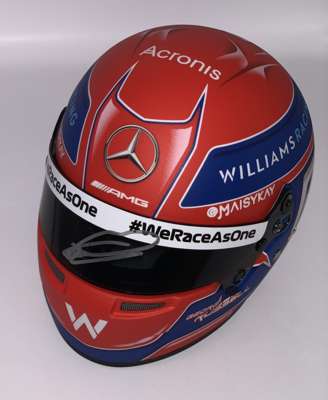 George Russell (UK) signed 2021 Williams F1 ½ Scale helmet, 
 Signed on Visor with Silver Sharpie. Includes signed 8 by 10in. action photograph of Geo
