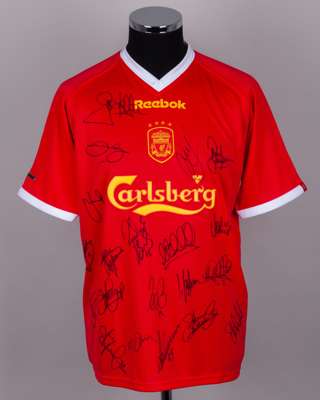 A red Liverpool autographed replica short-sleeved shirt