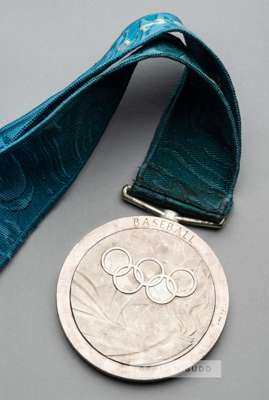 Sydney 2000 Olympic Games silver second prize medal for baseball,
 designed by Woljciech Pietrani and Brian Thompson, of circular form with suspension