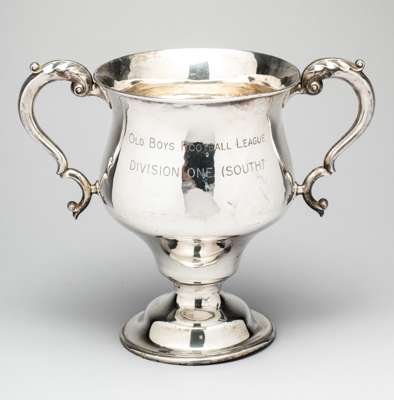 The trophy for the Old Boys Football League Division One (South) as presented by the Nemean Amateur Football League,
 in the form of a hallmarked silv