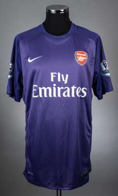 Wojciech Szczesny purple no.1 Arsenal goalkeeper jersey from the 2013-14 Premier League campaign.
 Player issued long sleeved NIKE example with the Ba