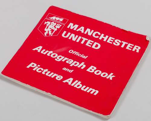 A Manchester United autographed book and picture album