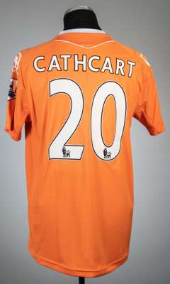Craig Cathcart orange Blackpool no.20 home jersey v Arsenal, played at Bloomfield Road, 10th April 2011,
 Carbrini, short-sleeved with BARCLAYS PREMIE
