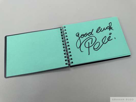 A football autograph book 
 including three sheets signed "good luck- Pele", "best wishes- Pele" and "To Doreen with love- Pele" "Martin Peters" in bl