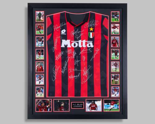 A red and black AC Milan autographed replica shirt display