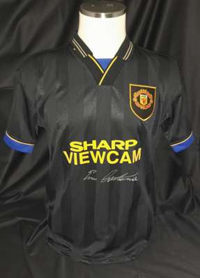 Manchester United Eric Cantona signed black away retro shirt as worn when he administered his Kung-Fu kick upon Matthew Simmons who launched a tirade 