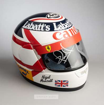 Nigel Mansell full scale 1992 Williams replica F1 helmet,
 with Ferrari visor signed in silver marker pen in a perspex display case