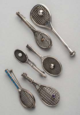 Six English and Continental silver tennis racquet brooches, 
 two with silver tennis ball on strings, one with niello decoration on handle, one with p