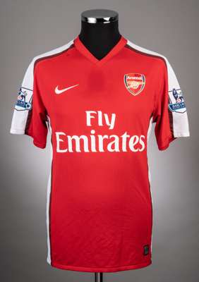 Eduardo da Silva red and white No.9 Arsenal short-sleeved jersey, 2008-10, 
 Nike, M, with v-neck collar and embroidered cloth badge inscribed ARSENAL
