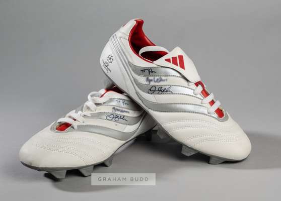 David Beckham signed pair of white and red Adidas Traxion Champions league football boots,
 both boots signed and dedicated by David Beckham, size 8.5
