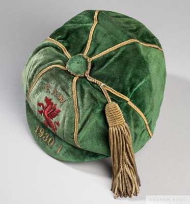 Green Wales International cap, 1930-31
 the green velvet cap with gilt tassel and gilt braiding, embroidered Wales crest and F.A.W, 1930-1

 We are un