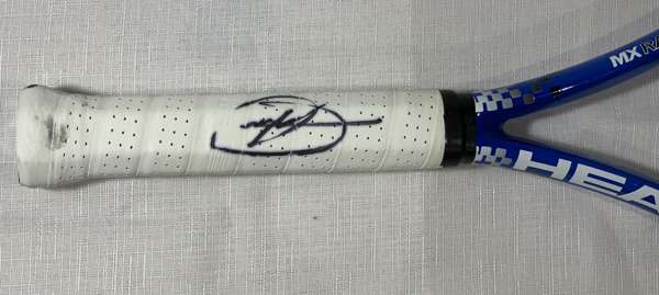 Novak Djokovic (Serbia) signed Head official tennis racquet, 
 same brand as he uses, signed on white grip with black permanent marker. Novak Djokovic