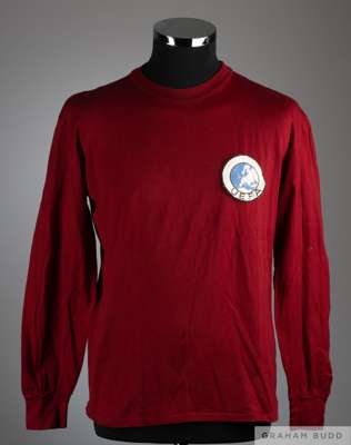 Maroon No.4 Portugal Youth International shirt, 1960s
 with crew-neck collar and embroidered cloth badge inscribed UEFA

 The above shirt was worn in 