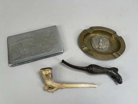 A white-metal and brass ashtray commemorating the 1958 F.A. Cup Final between Bolton Wanderers and Manchester United, 
 a white-metal cigarette case d