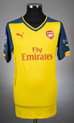 Lukas Podolski yellow and blue No.9 Champions League short-sleeved jersey, 2014-15, 
 Puma, XL, with v-neck collar and badge inscribed Arsenal, the re