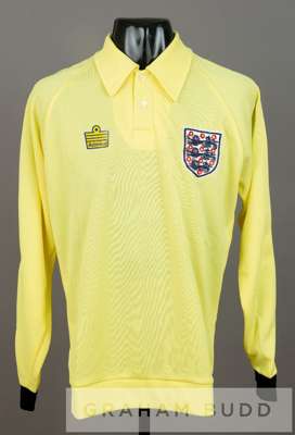 Peter Shilton yellow and black England no.13 goalkeeper's jersey, circa mid 1970s,
 by Admiral, long-sleeved with England three lion badge and sponsor
