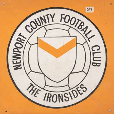Unique rare Newport County liquidation 1988-89 wooden sign,
 approx. 18 by 18in., painted in Newport County colours with then club badge with the Iron