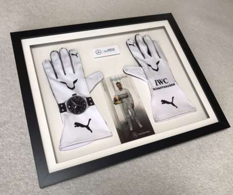 Lewis Hamilton replica 2014 Puma race gloves in framed display,  

these replica Lewis Hamilton gloves are of the same design as Lewis’ 2014 season ra