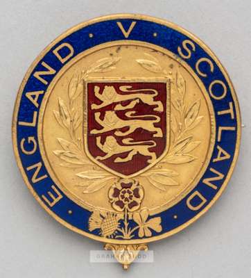 An unusually large Football Association badge issued to F.A. official Charles James Hughes (1853-1916) for a Scotland international match, circa 1910s