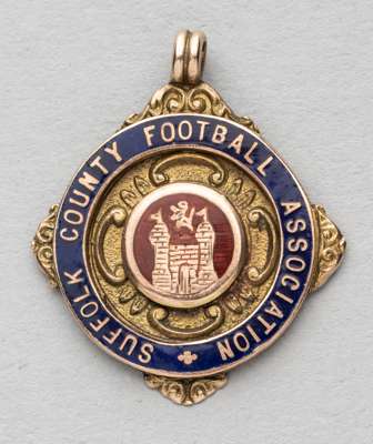 Suffolk County Football Association Senior Cup winner's medal awarded to an Ipswich Town player, 1927-28,
 obverse enamelled with county crest and let