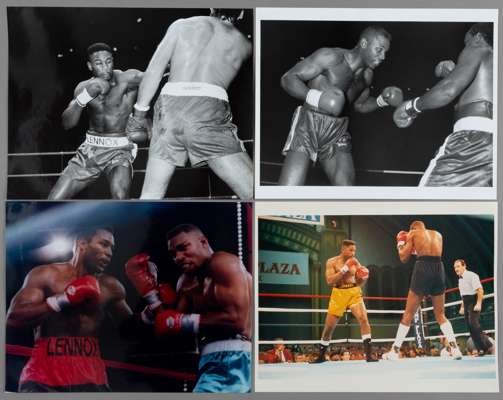 Lennox Lewis superb binder of b & w and colour press photographs,
 14 by 12in. b & w (3), colour (10) all in binder with press accreditation to rear, 