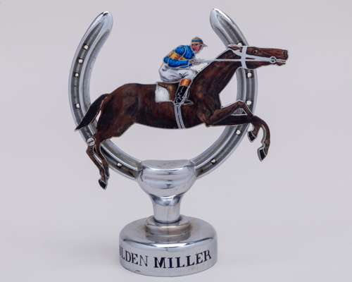 Golden Miller racehorse and jockey car mascot