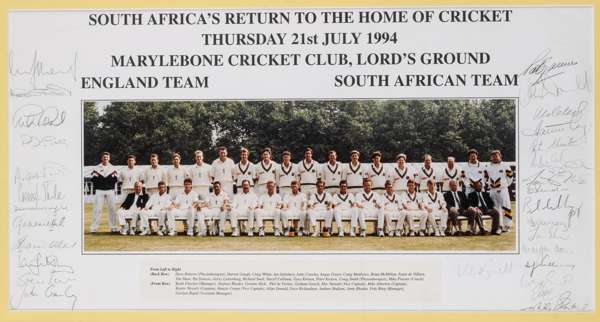 Signed England v South Africa team photograph on their return to the home of cricket Lord's Cricket Ground, 21st July 1994,
 14 by 42cm. colour photog