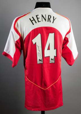 Thierry Henry signed Arsenal No.14 replica home jersey, signed in black marker pen to the reverse No.14,; sold with a COA issued by Arsenal FC in 2007