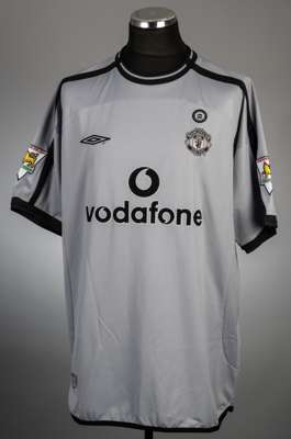 Fabien Barthez grey with black trim Manchester United no.1 goalkeeper's jersey, season 2001-02,
 Umbro, short-sleeved with THE FA PREMIER LEAGUE CHAMP