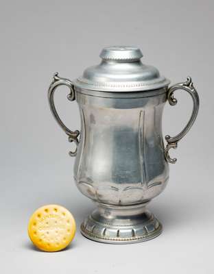 A rare Huntley & Palmer's biscuit tin designed as the FA Cup trophy and issued in 1927 in anticipation of Reading FC reaching the FA Cup final,
 in al