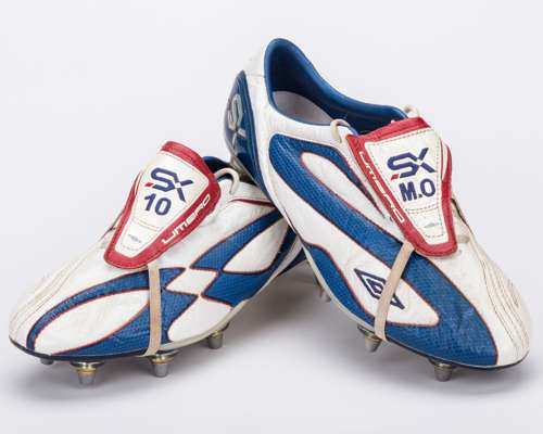 Michael Owen a pair of white, blue and red match worn Umbro FX football boots, 2008