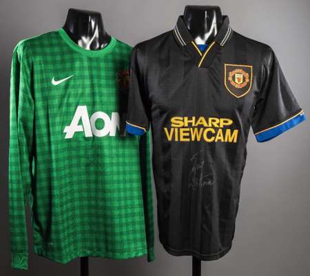 Manchester United replica jerseys signed by Eric Cantona & Peter Schmeichel, black 'Kung-Fu' shirt signed by Cantona in silver marker pen; and a green