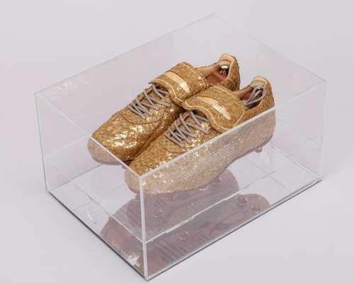 A rare pair of limited edition Alexander McQueen Puma King football boots