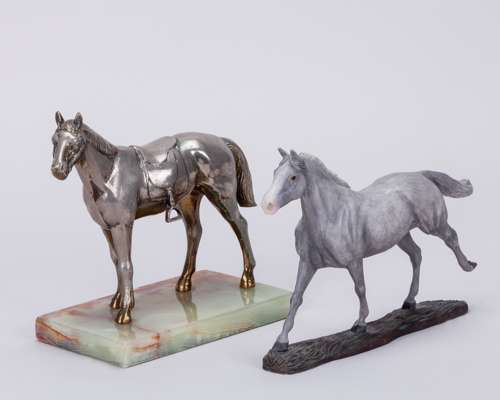 Two metalware horses