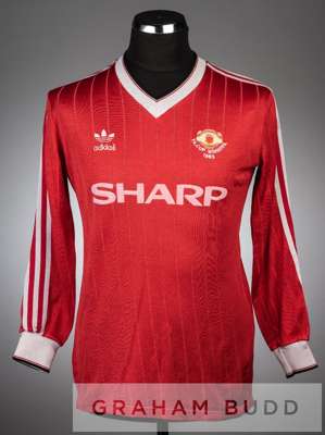 Red and white Manchester United no.16 substitute's home jersey, season 1983-84,
 long-sleeved, embroidered with F.A. CUP WINNERS 1983, club crest and 