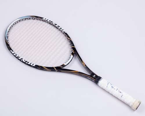 A Dunlop 1 Hundred tennis racket, the handle autographed by Bjorn Borg